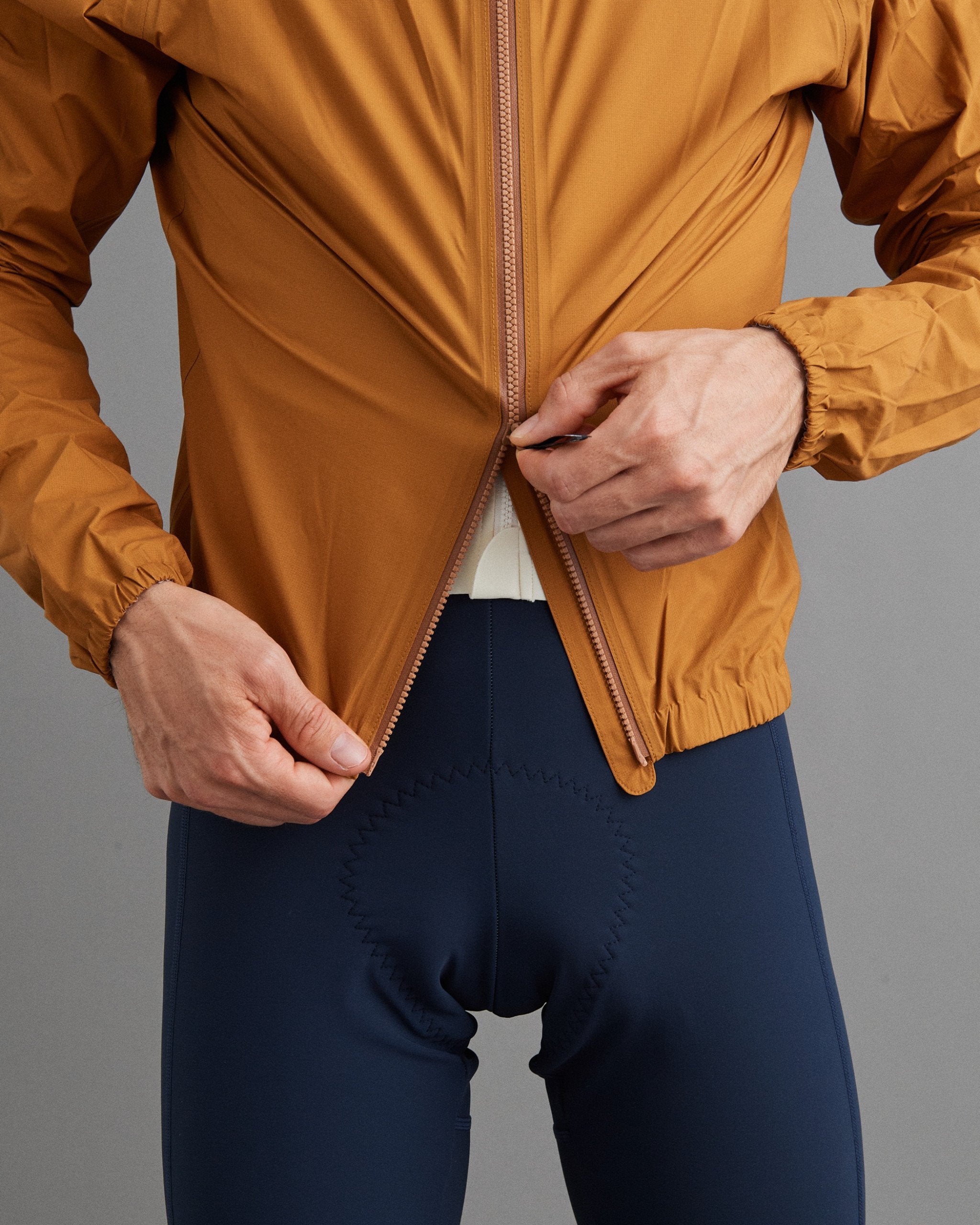 Men's Mechanism Pertex Rain Jacket - Burned Orange